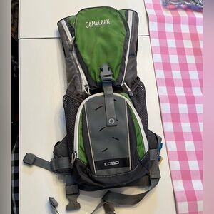 Green CamelBak hiking backpack with water bladder